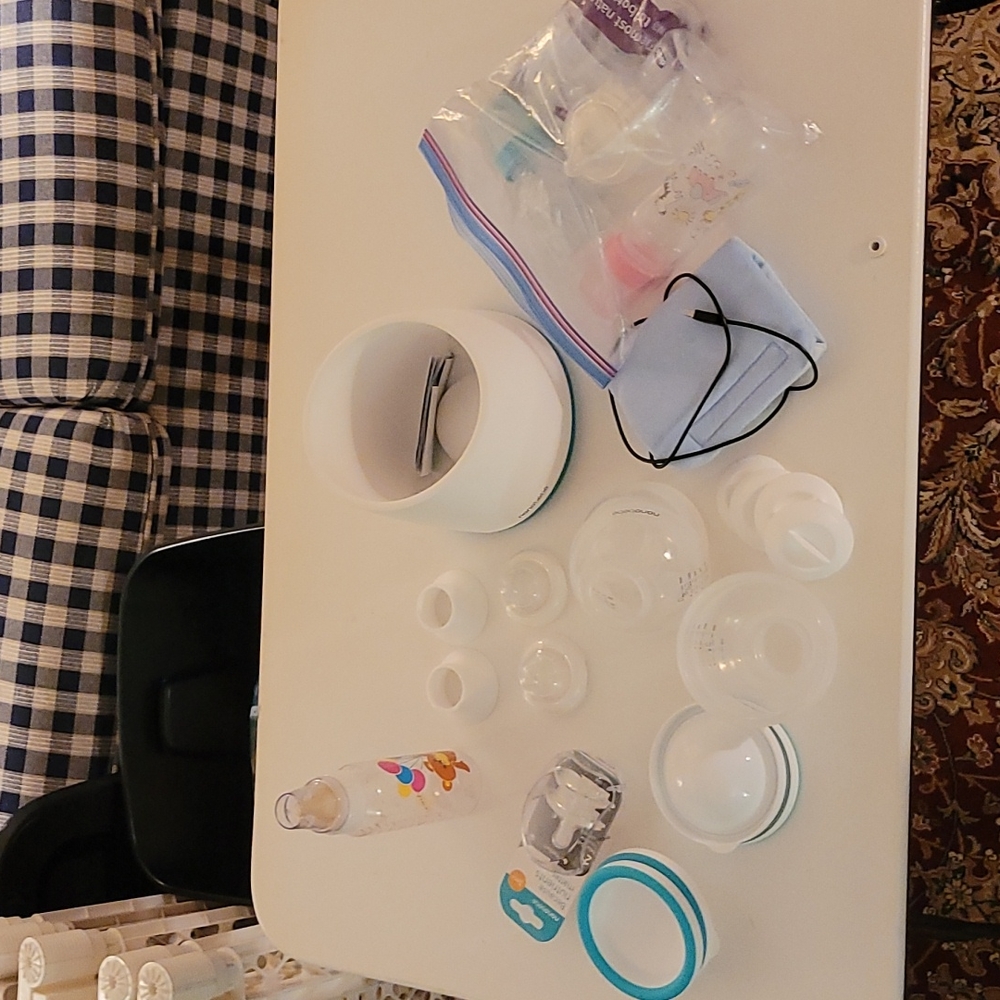 Nanobébé bottles and accessories, warmers, and bag of assorted bottles